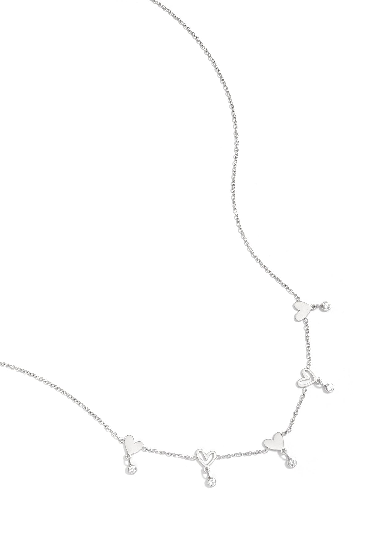 Ketting met wisselende hartjes en hangende steentjes