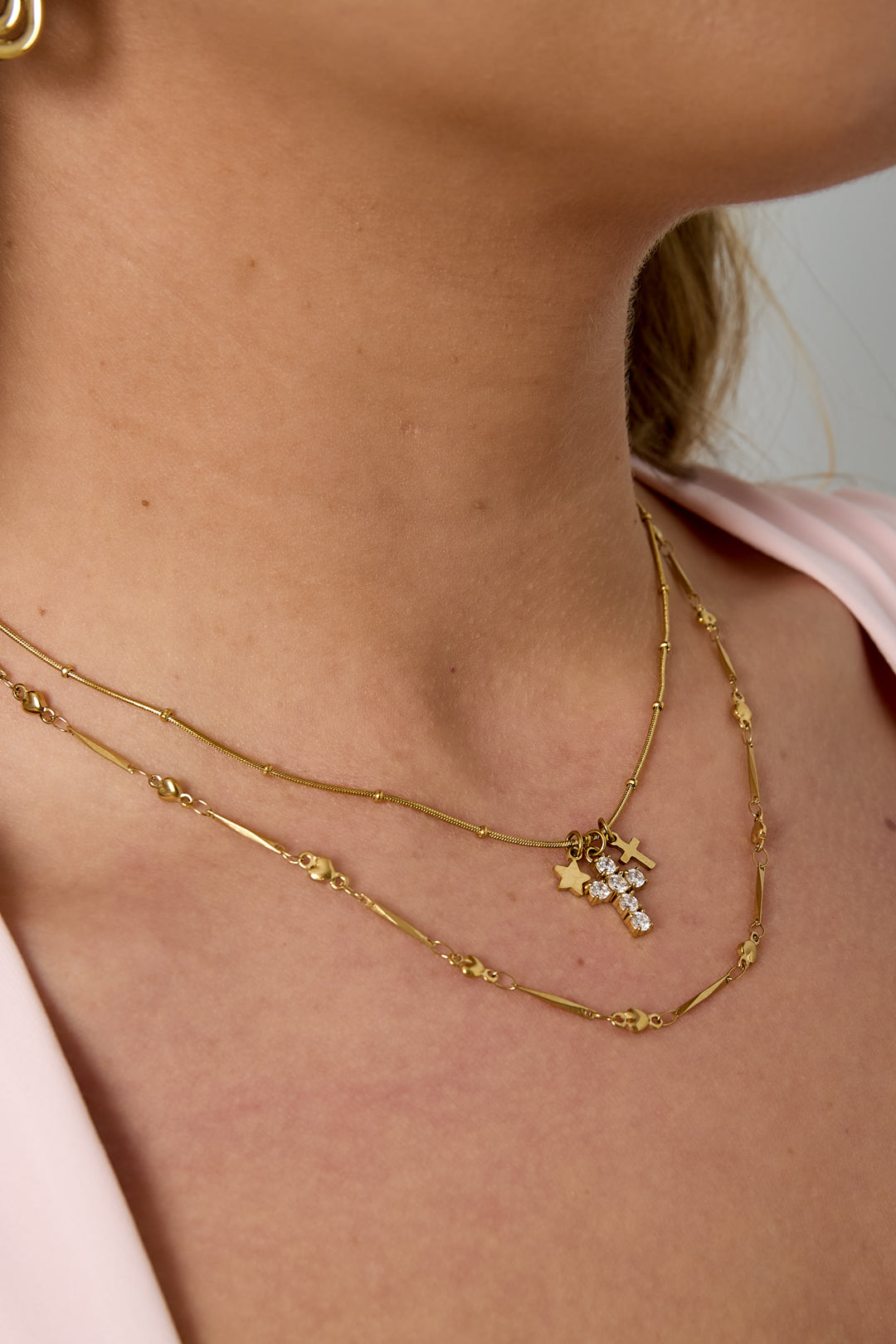 Ketting met kruis en ster charms