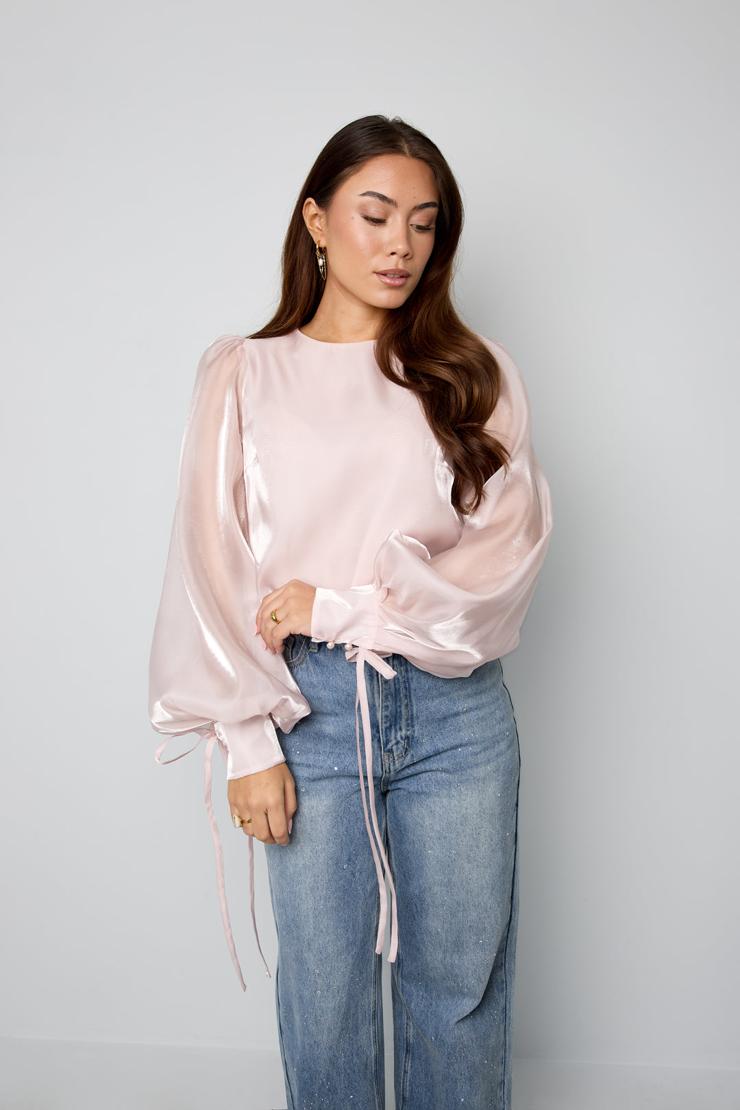 Glanzende parelblouse