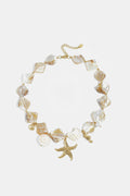 Ketting met schelpen, zee charms en goude kraaltjes