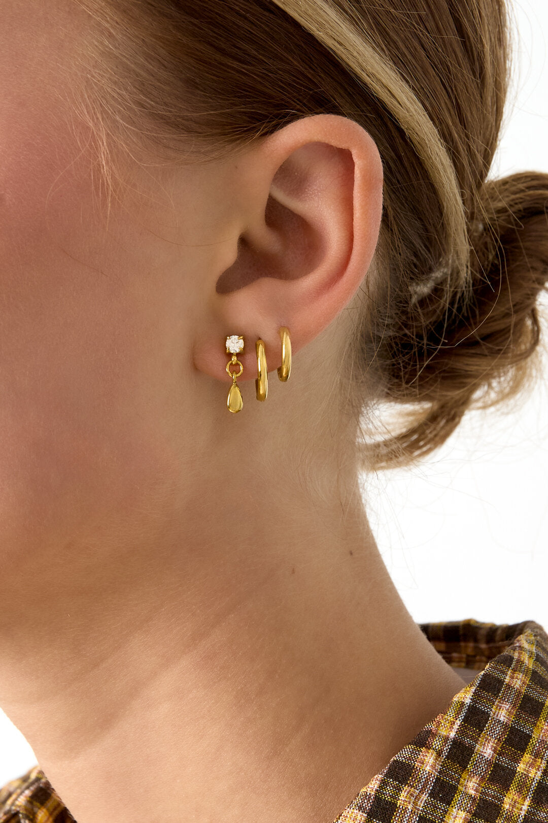 Stud oorbellen met hangende druppel