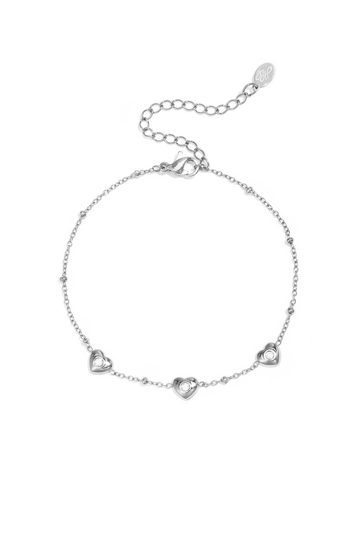Armband met bolletjes en hartjes met steen
