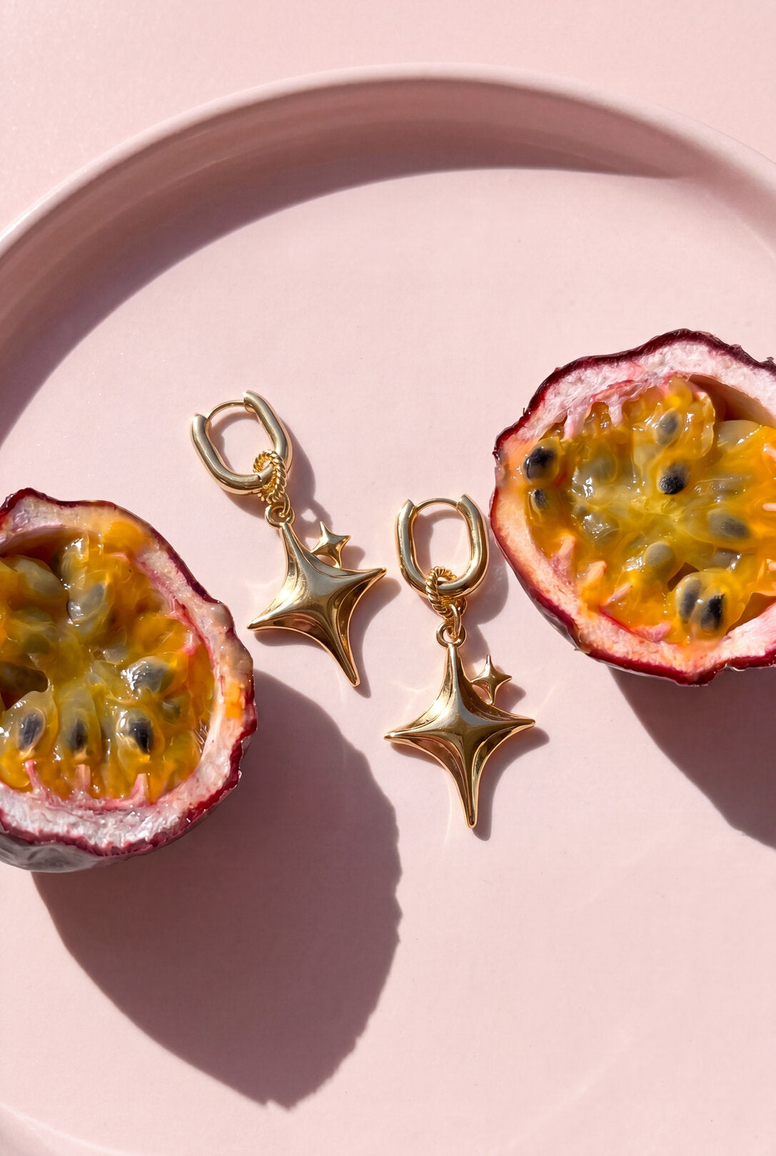 Squoval oorbellen met glinsterende ster hanger