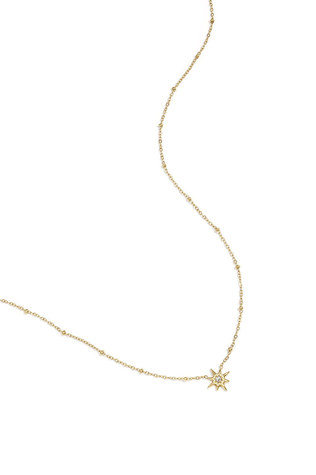 Ketting met bolletjes en vallende ster