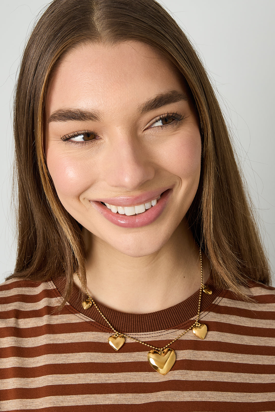 Ketting met bolletjes en verschillende vormen harten