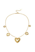 Ketting met bolletjes en verschillende vormen harten