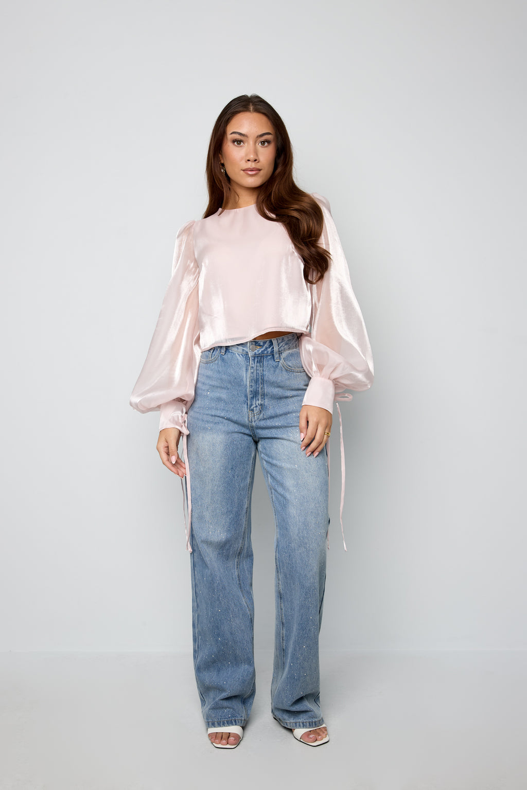 Glanzende parelblouse