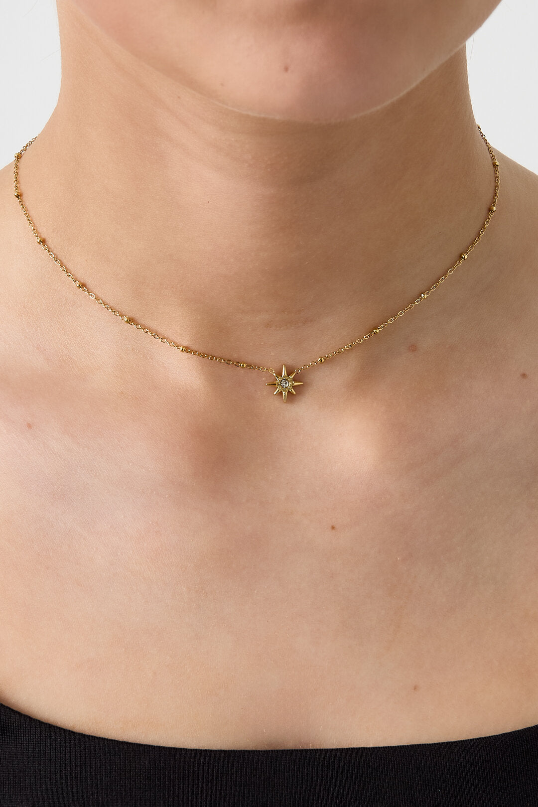 Ketting met bolletjes en vallende ster
