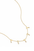 Ketting met wisselende hartjes en hangende steentjes