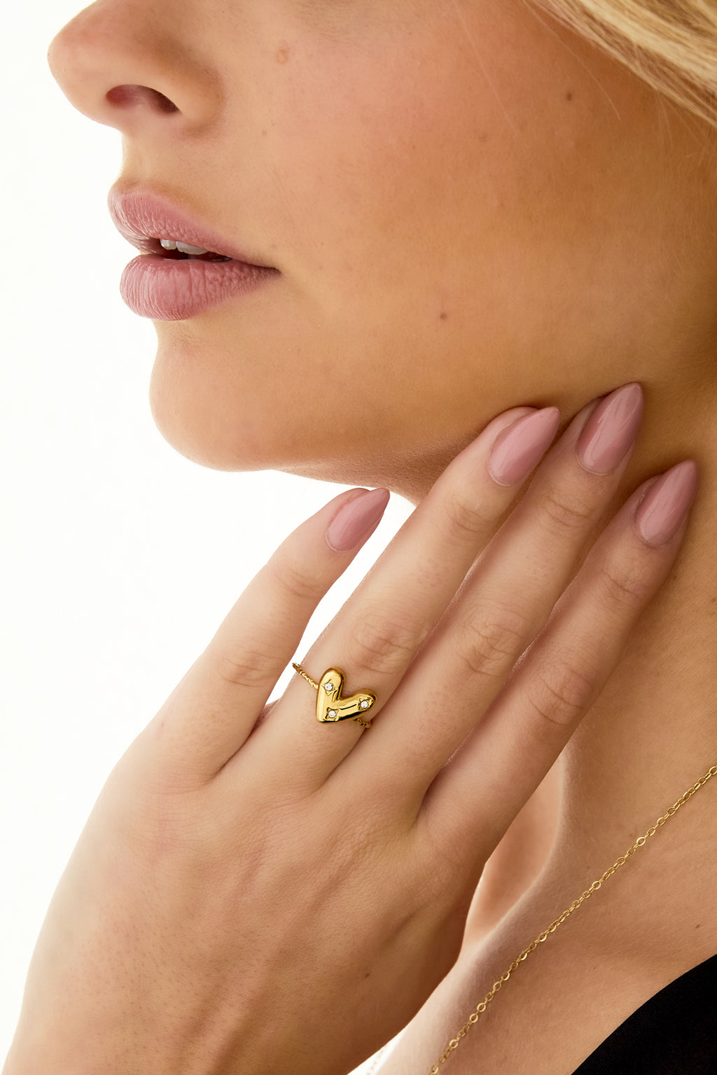 Verstelbare ring met belegd hart